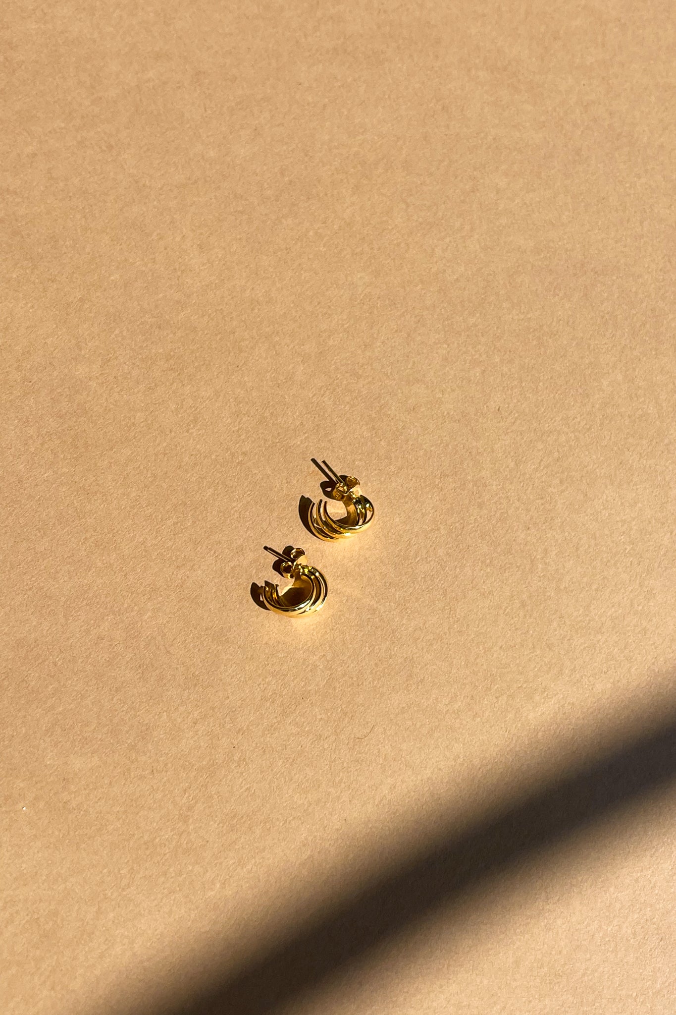 Eliza Gold Filled Mini Scoop Earring- front flat lay view