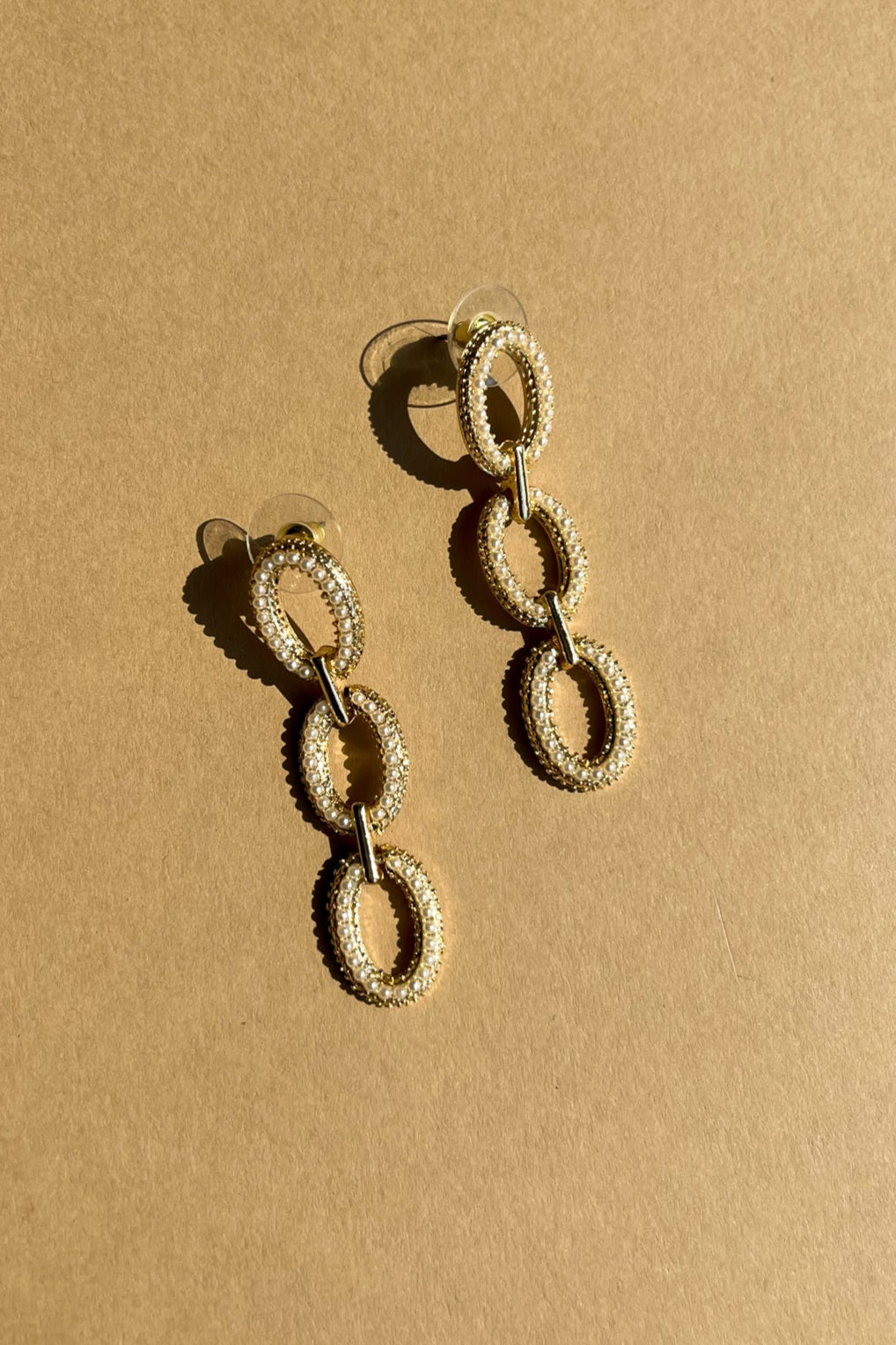 Melinda Gold & Pearl Chain Earrings - close up flat lay view