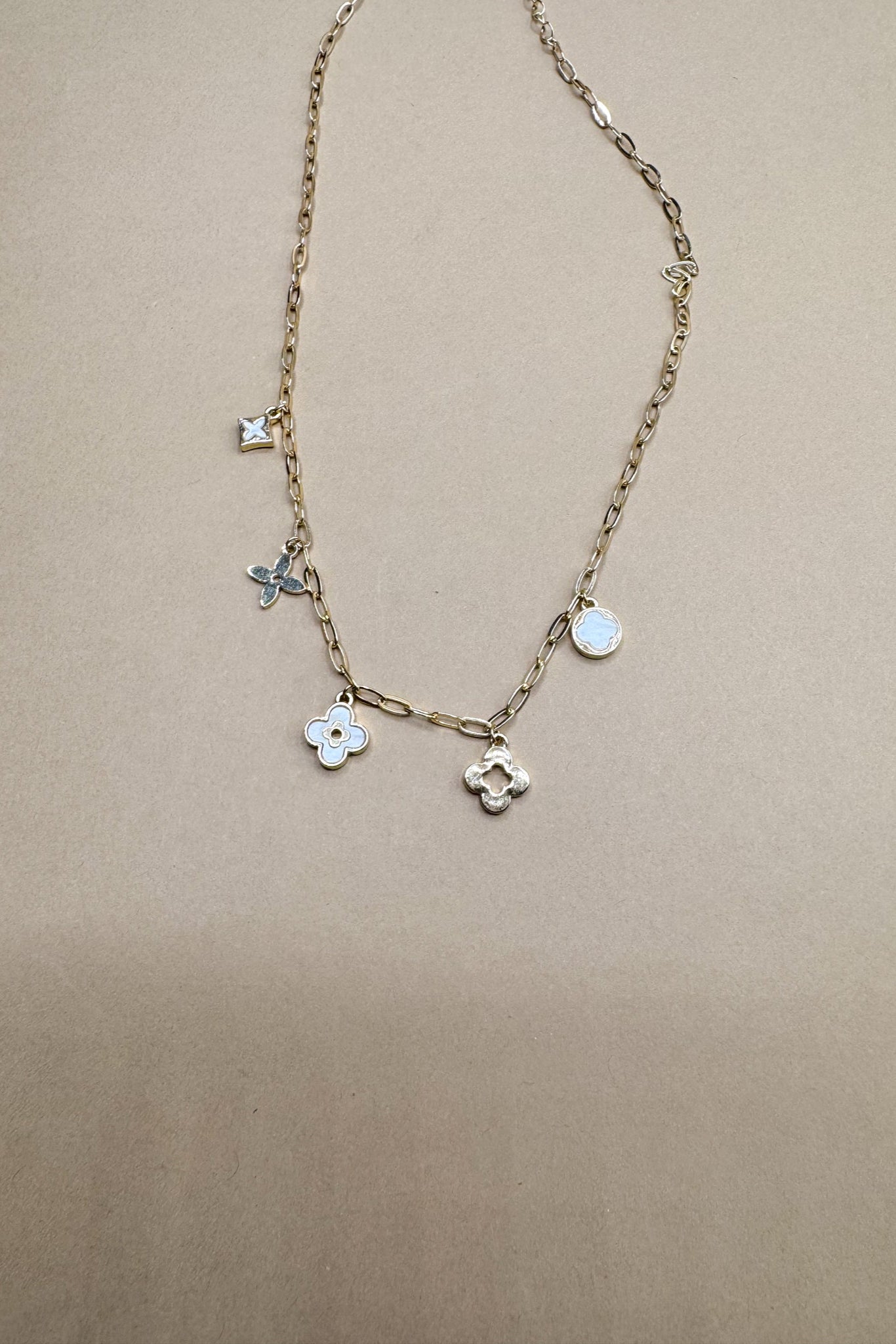 Grace Ivory & Gold Charm Necklace- close up view