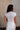 Janelle White Mock Neck Top -back view