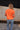 Tara Orange Braided Sleeve Tee - back view
