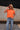 Tara Orange Braided Sleeve Tee - front