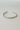 More Than Enough Bangle - silver - flat lay close up