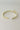 Be Strong And Courageous Bangle - gold - flat lay close up