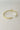 Be Strong And Courageous Bangle - gold - flat lay side view