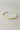 Be The Light Bangle - gold - flat lay close up