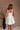 Sadie White Flare Mini Dress- close up back view