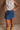 Jane Medium Denim Mini Skort- close up front view