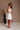 Sadie White Flare Mini Dress- full body side view 