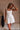 Sadie White Flare Mini Dress- close up front view