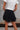 Gabby Black Polka Dot Tiered Mini Skirt -back