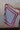 Emmie Red, White, & Navy Striped Satin Scarf - held by model