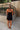 Kelcie Black Polka Dot Halter Mini Dress - full body back view