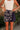 Kimi Navy & White Floral Skort - close up front view