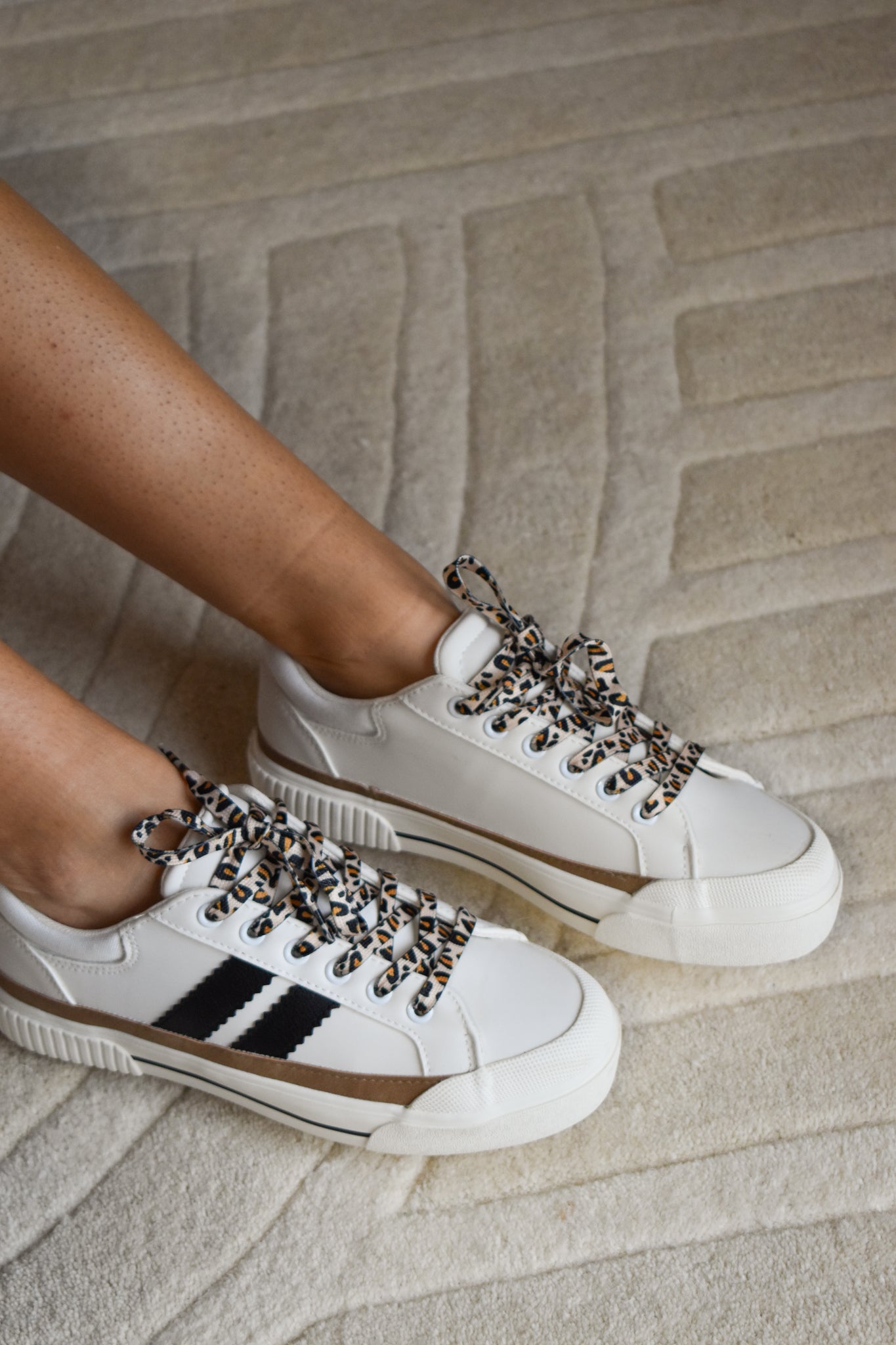 Image shows top view of model's feet; model is wearing the That's Her Platform Sneakers.