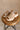 Side view of the Kinetic Impact Slide High Wedge Sandal in Honest Beige & Honest White which features Sporty Slip-On Style, Beige and Cream Leather Upper, Two-Tone Scalloped Sole Detail, Molded Rubber Outsole, 2 1/4" Heel Height and 1 1/4" Platform Height