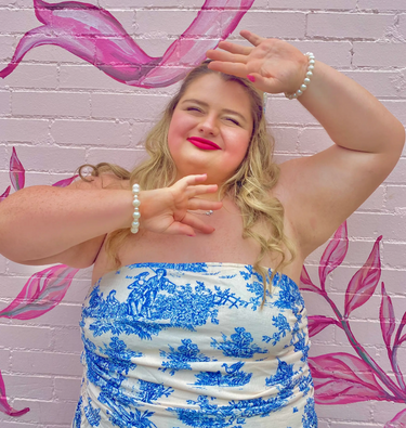 image of girl in a blue and white patterned dress