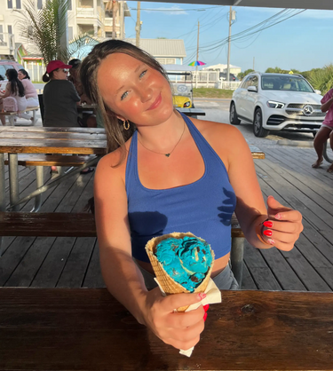 image of girl in a blue tank top