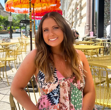 image of girl wearing patterned dress