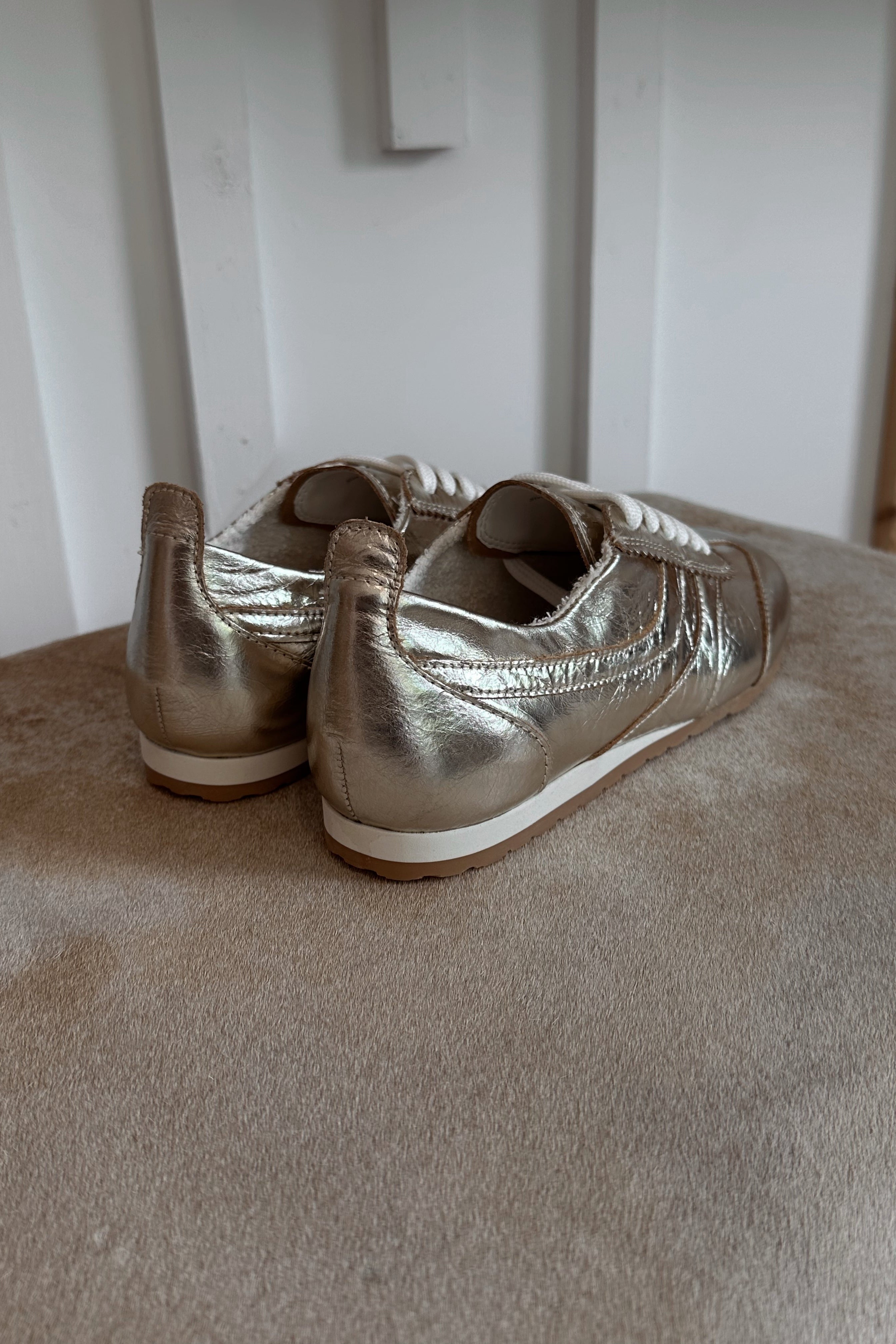 Dolce Vita Delany Light Gold Crinkle Patent Sneaker- heel view