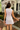 Amelia Lavender Ruched & Buttoned Mini Dress- close up back view