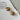 Margaret Gold Starburst Scoop Huggie Earrings - flat lay 
