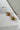 Margaret Gold Starburst Scoop Huggie Earrings - flat lay 