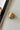 Morgana Gold Ribbed Hoop Earrings - close up flat lay