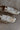 Dolce Vita Delany Light Gold Crinkle Patent Sneaker- top close up view