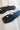 Billini Taron Black & Gold Thong Strap Sandal - close up view