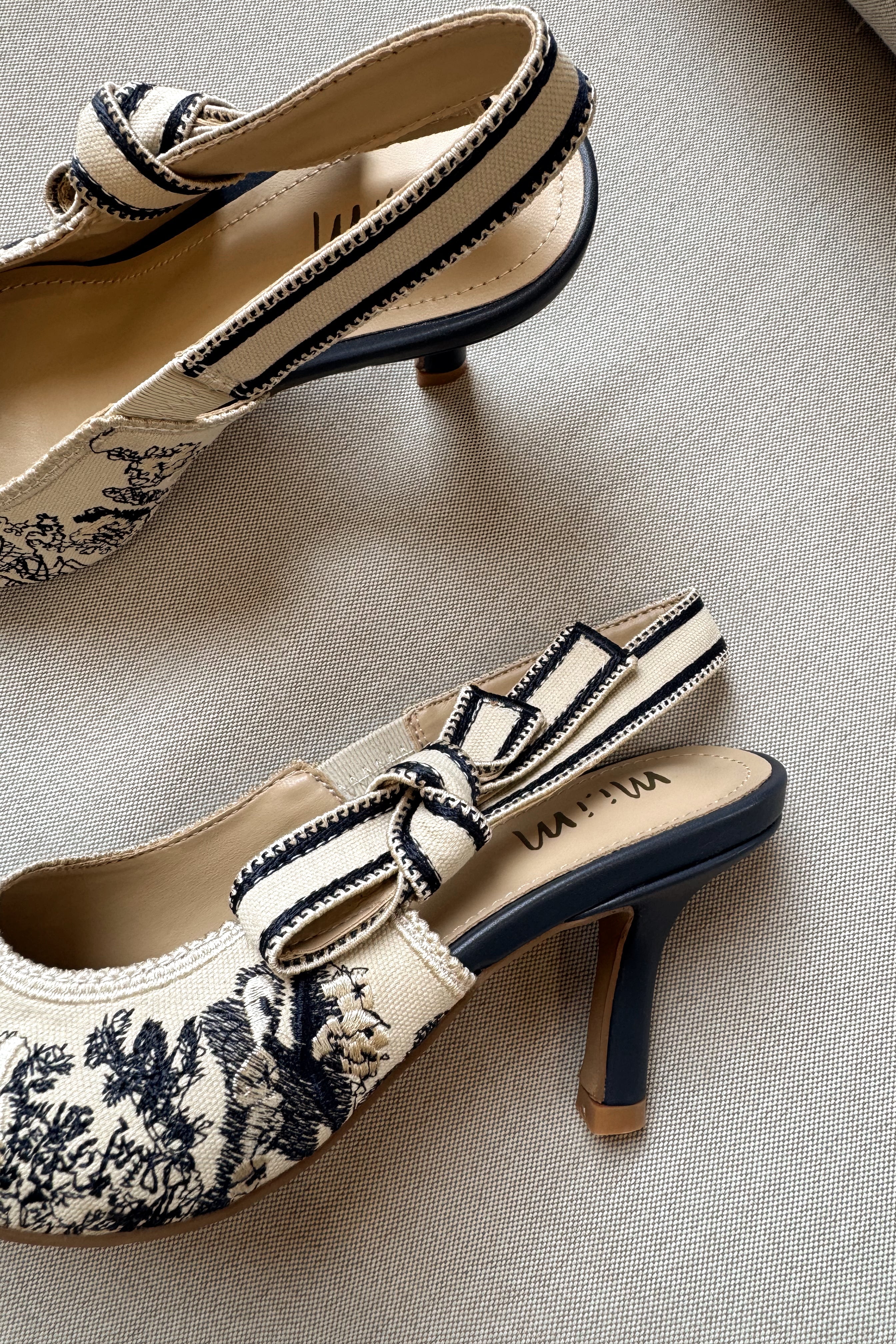 Solana Blue & Ivory Slingback Tie Heel- close up side view