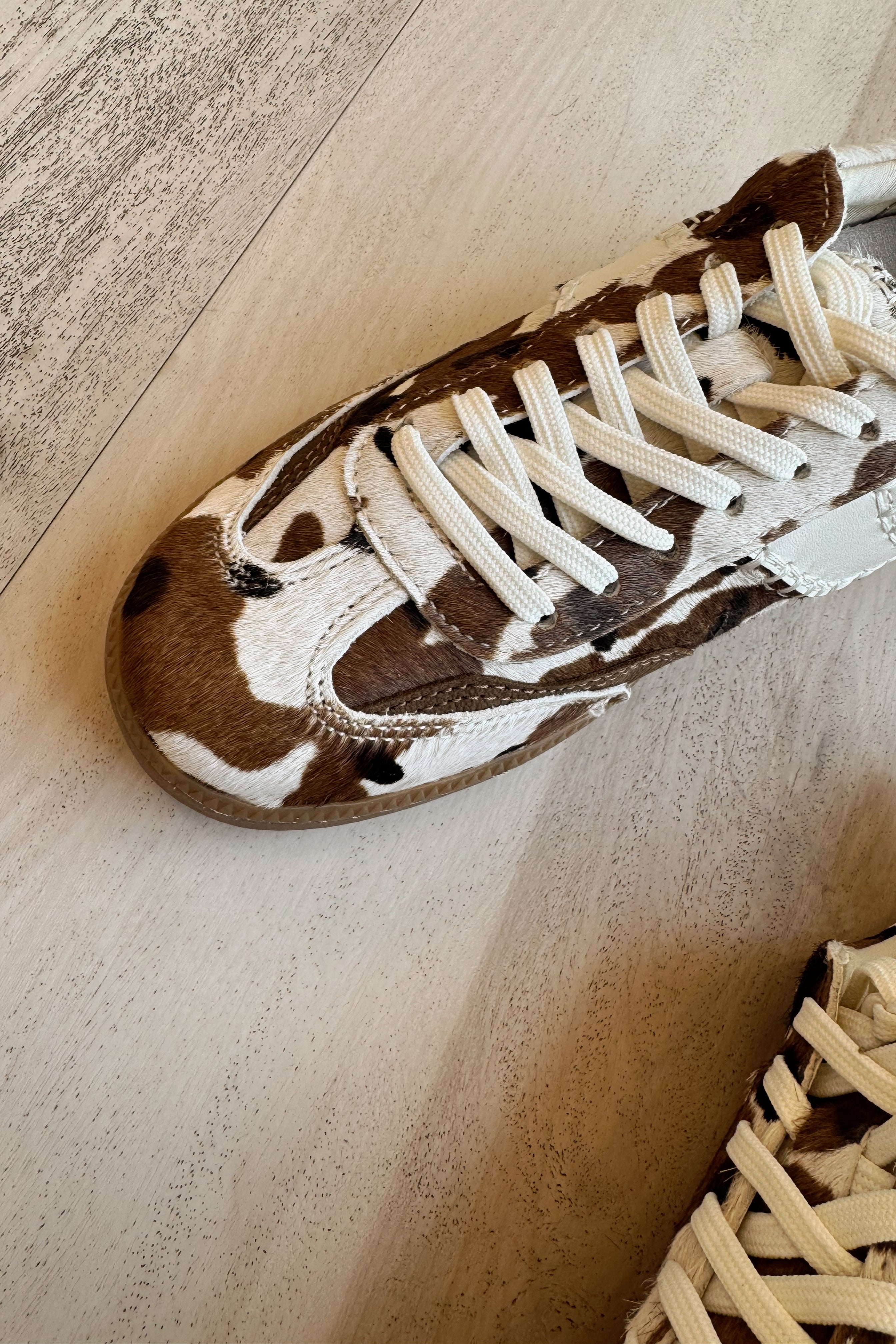 Dolce Vita Notice Stitch Cocoa Taurus Calf Hair Sneaker- close up front toe view