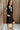 Amy Sleeveless Knit Mini Dress - frontal side view- black