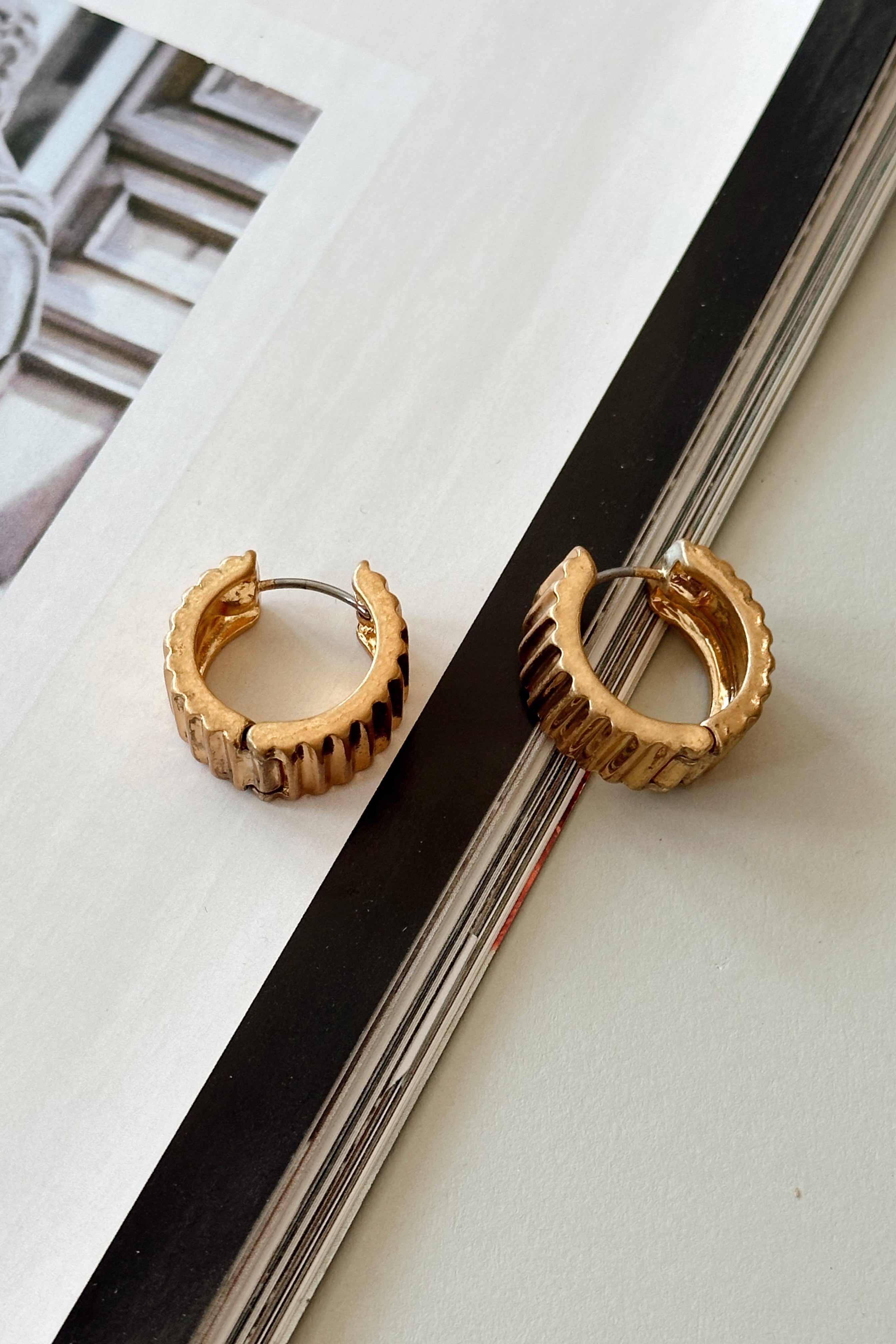 Leah Gold Ribbed Hoop Earrings - flat lay 
