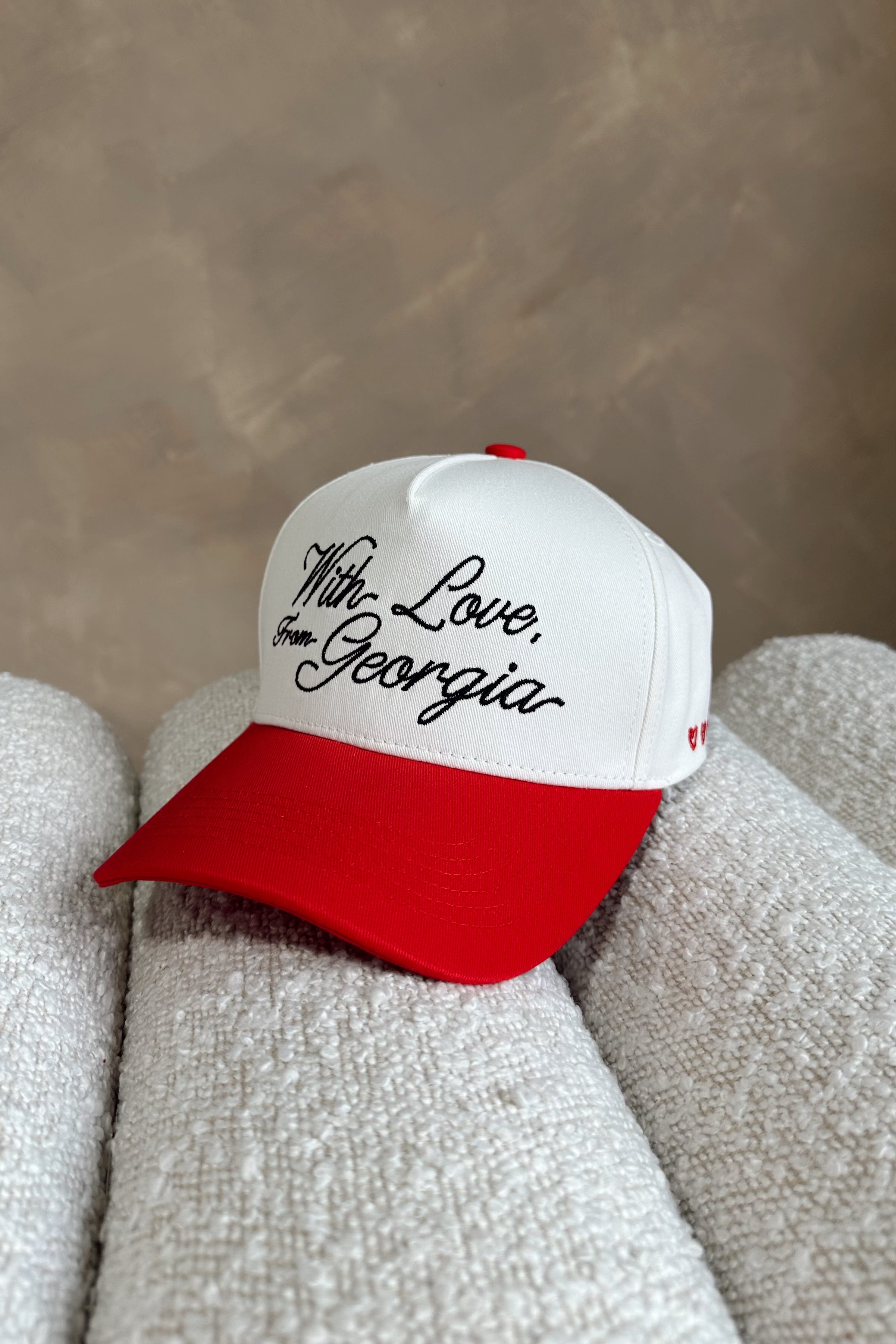 front view of the With Love From Georgia Trucker Hat