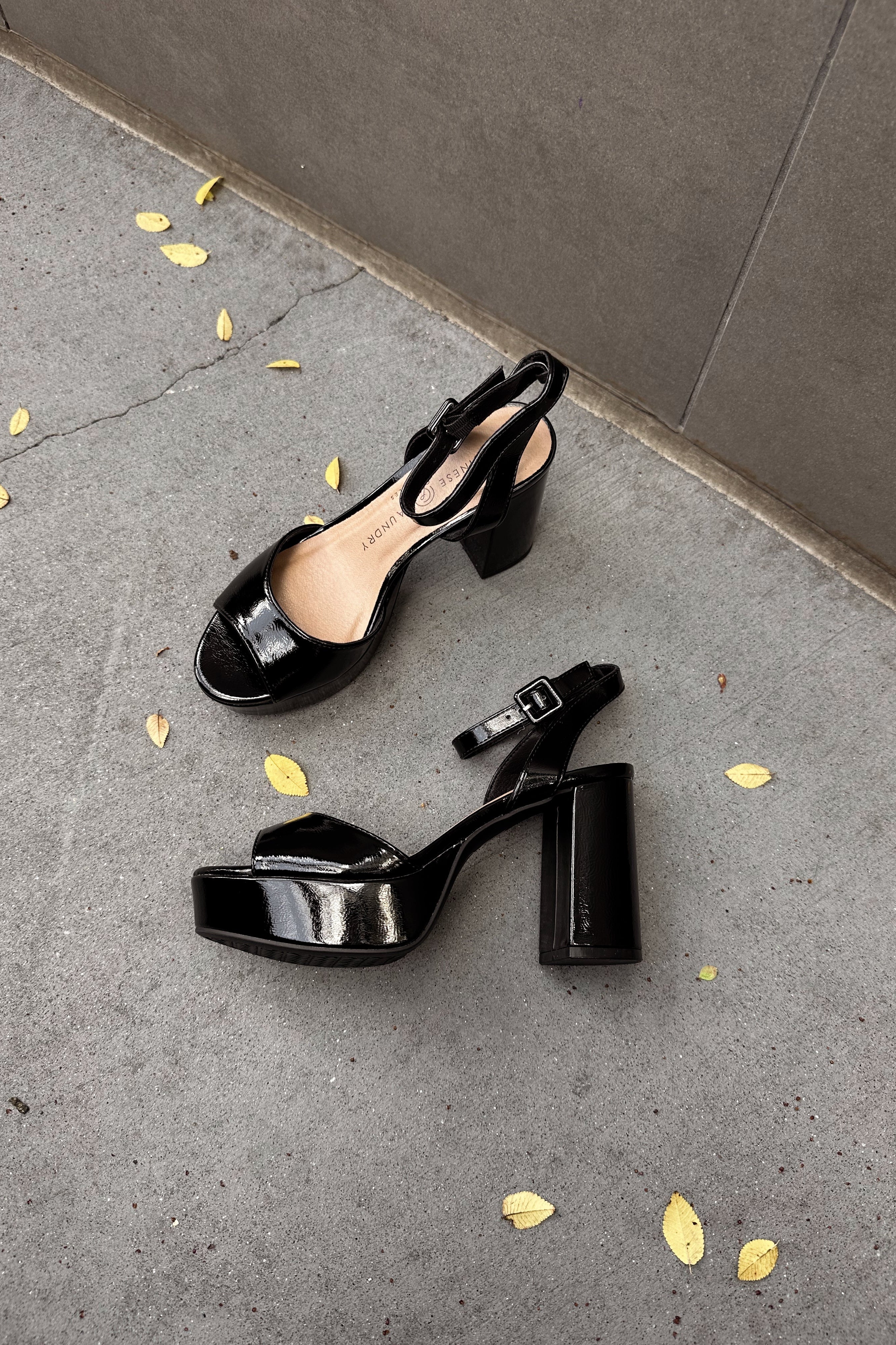 Chinese Laundry Theresa Black Patent Platform Heel- close up flat lay view