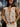 model in multi embroidered tank