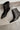 Chinese Laundry Novalie Black Bootie- close up flat lay view