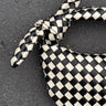 Tessa Black & White Checkered Knot Purse- left side view