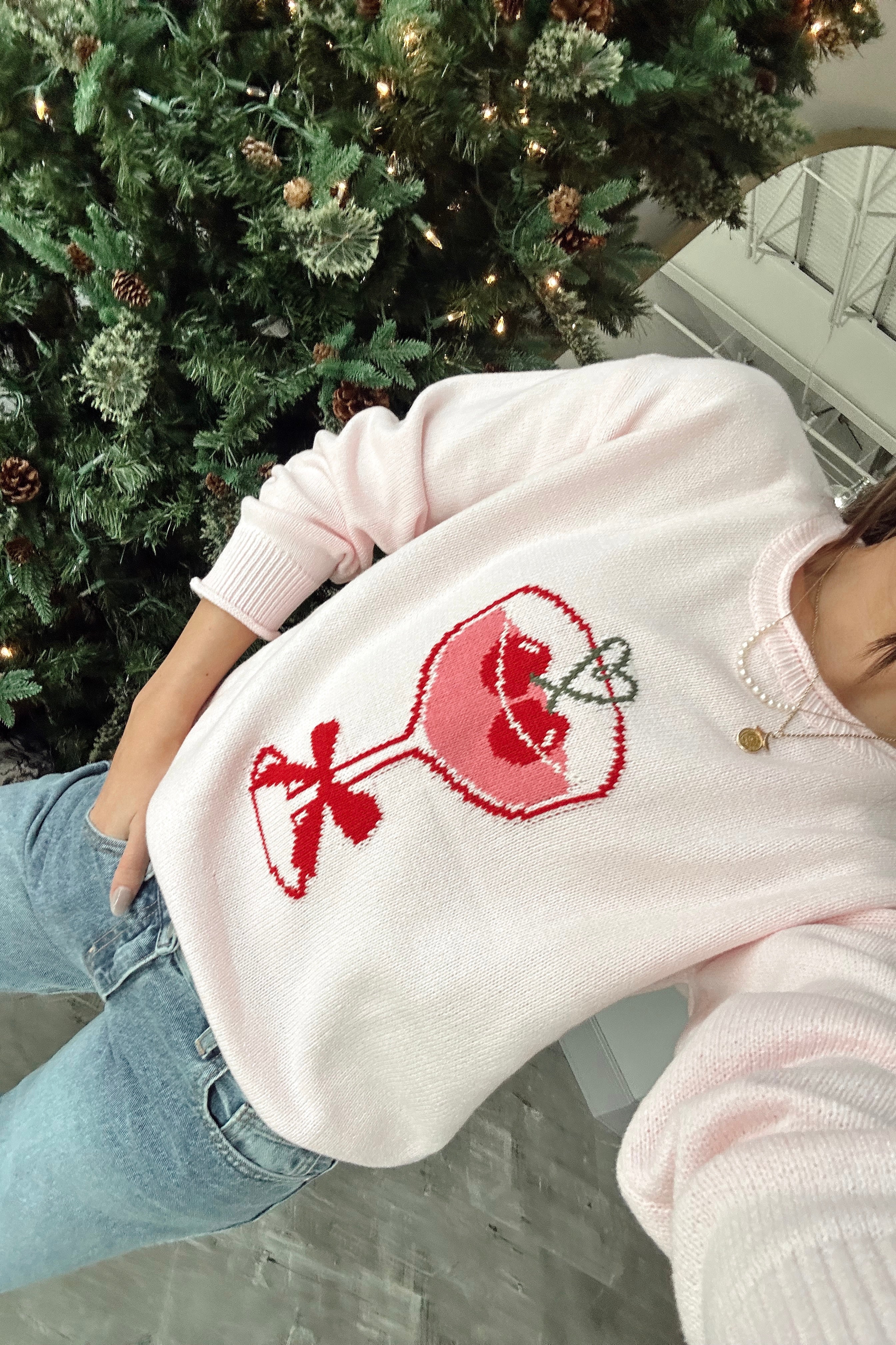 Eve Light Pink Cherry Martini Sweater - angled front view