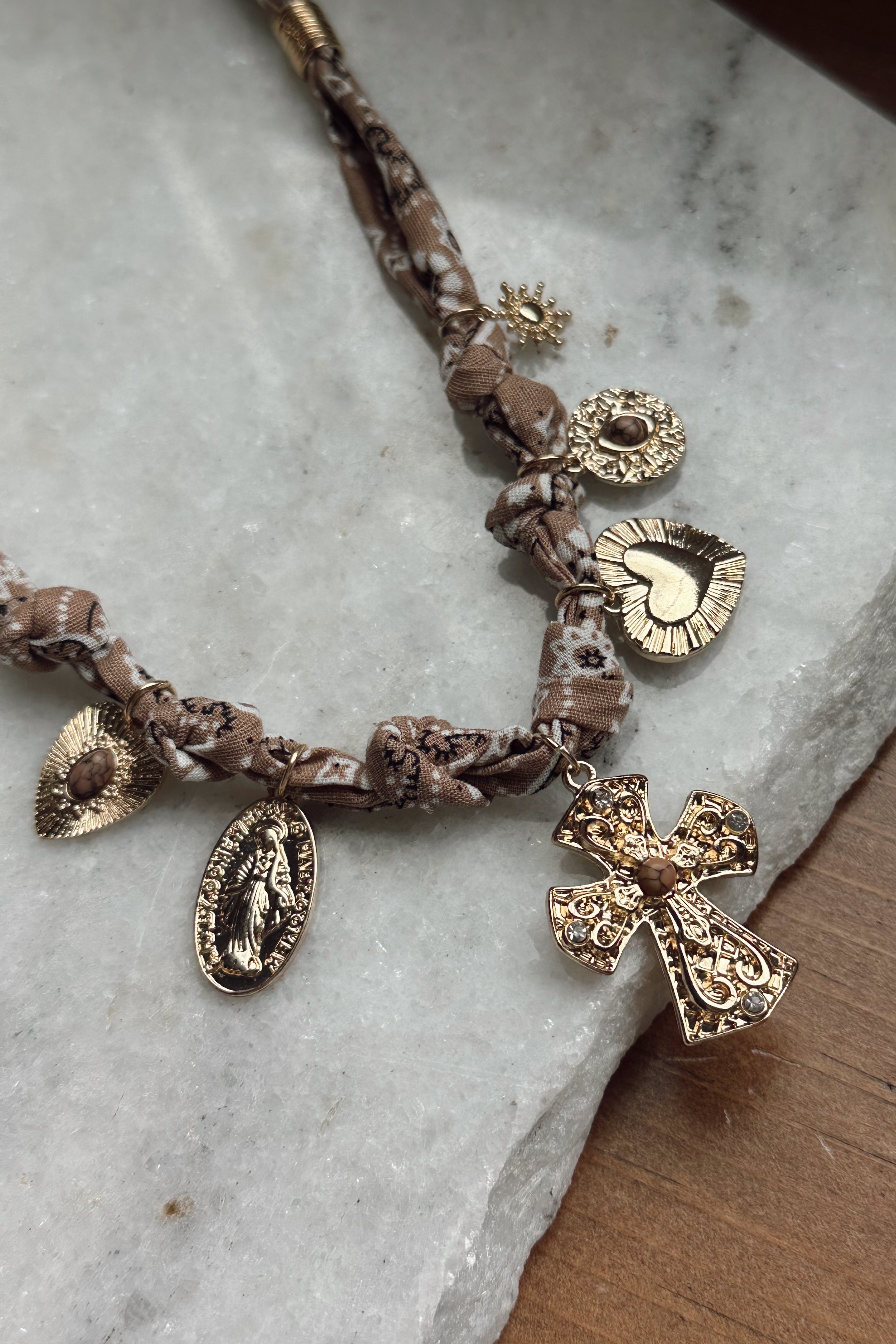 Taryn Beige Western Scarf & Charms Necklace- close up flat lay view