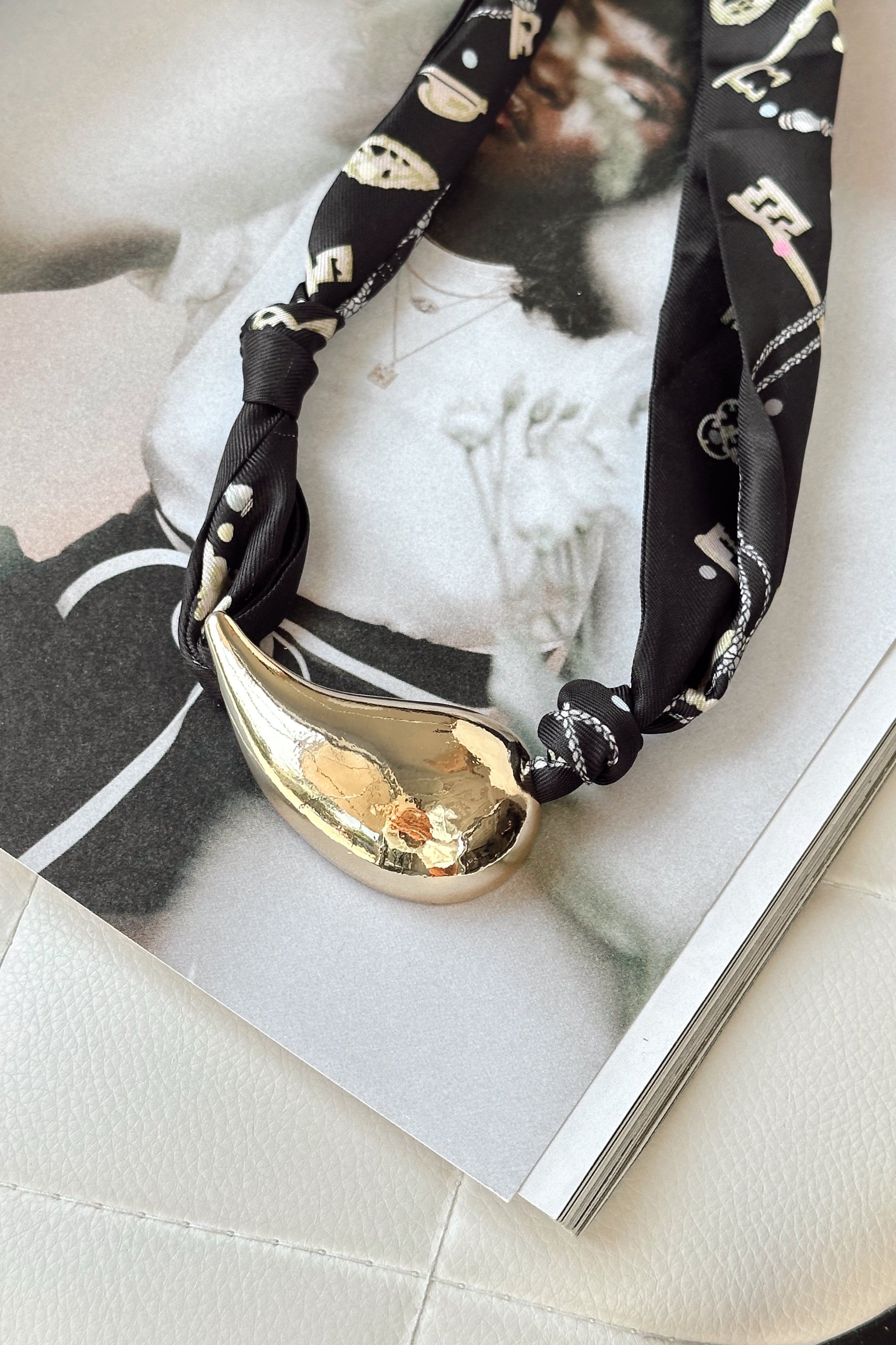 Charlotte Black & Gold Scarf Necklace- close up front view
