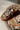 Sorel Rein Lace Brown & Black Platform Sandal- flat front view
