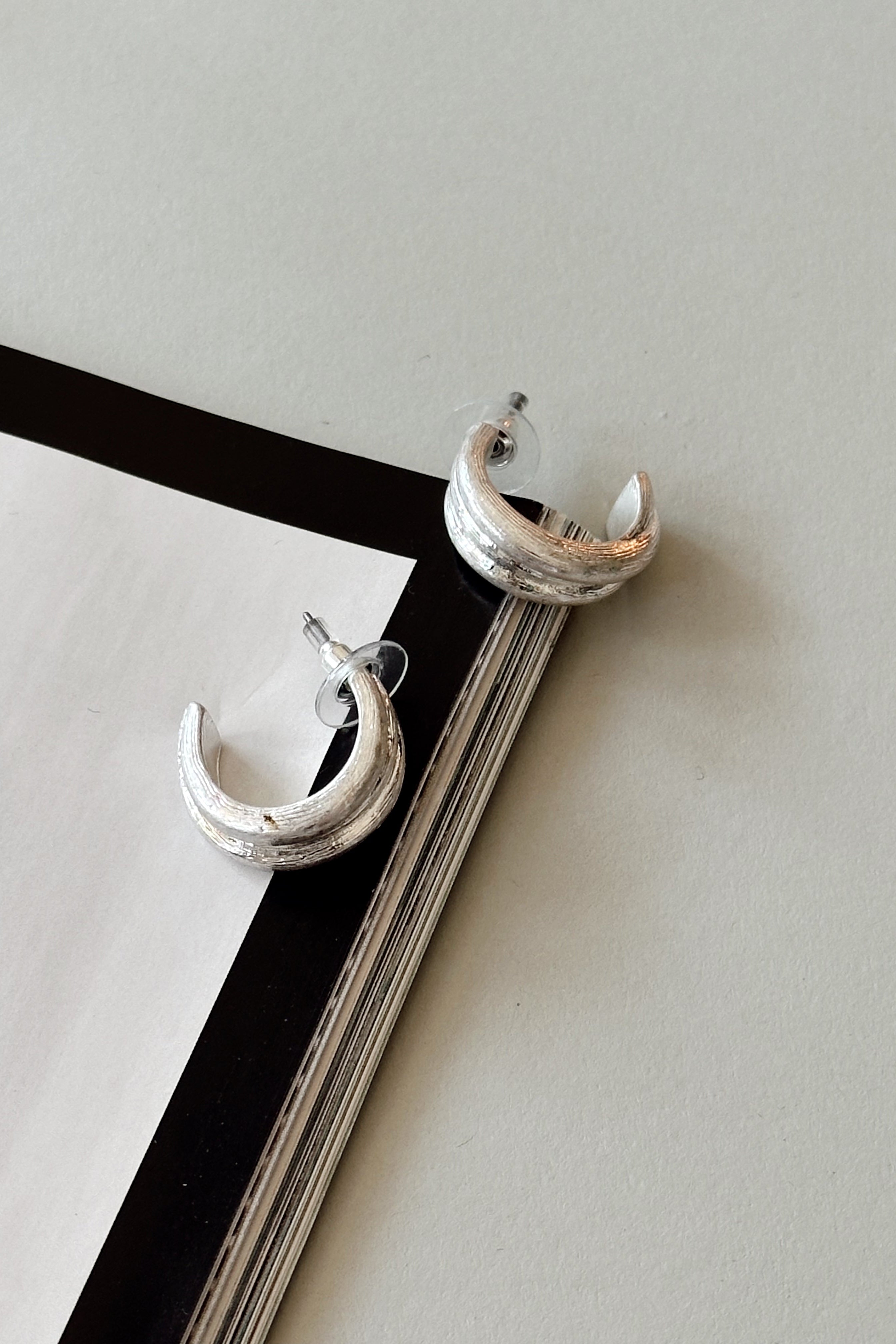 Tana Brushed Silver Hoop Earrings - flat lay
