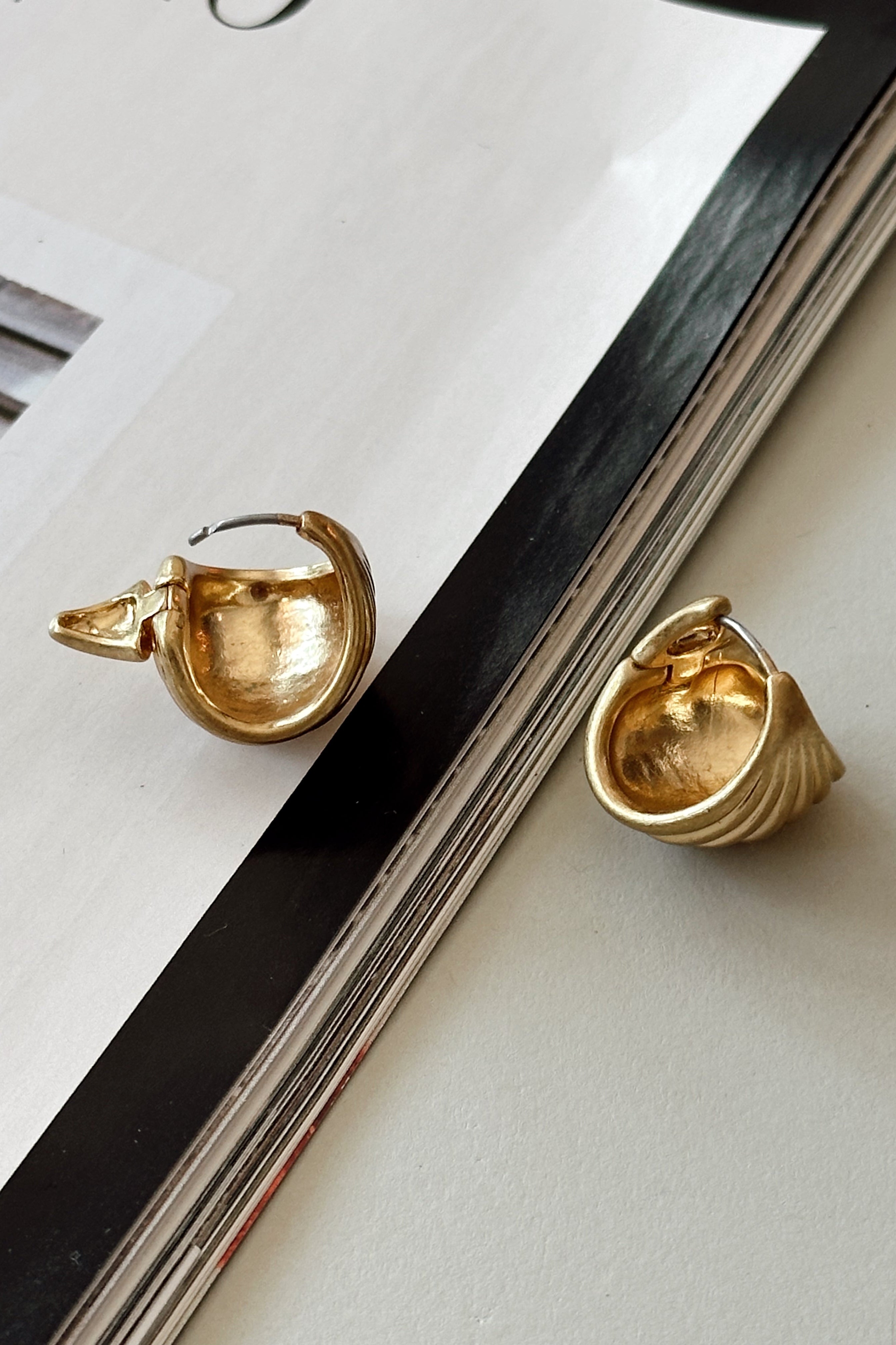 Morgana Gold Ribbed Hoop Earrings - back view flat lay