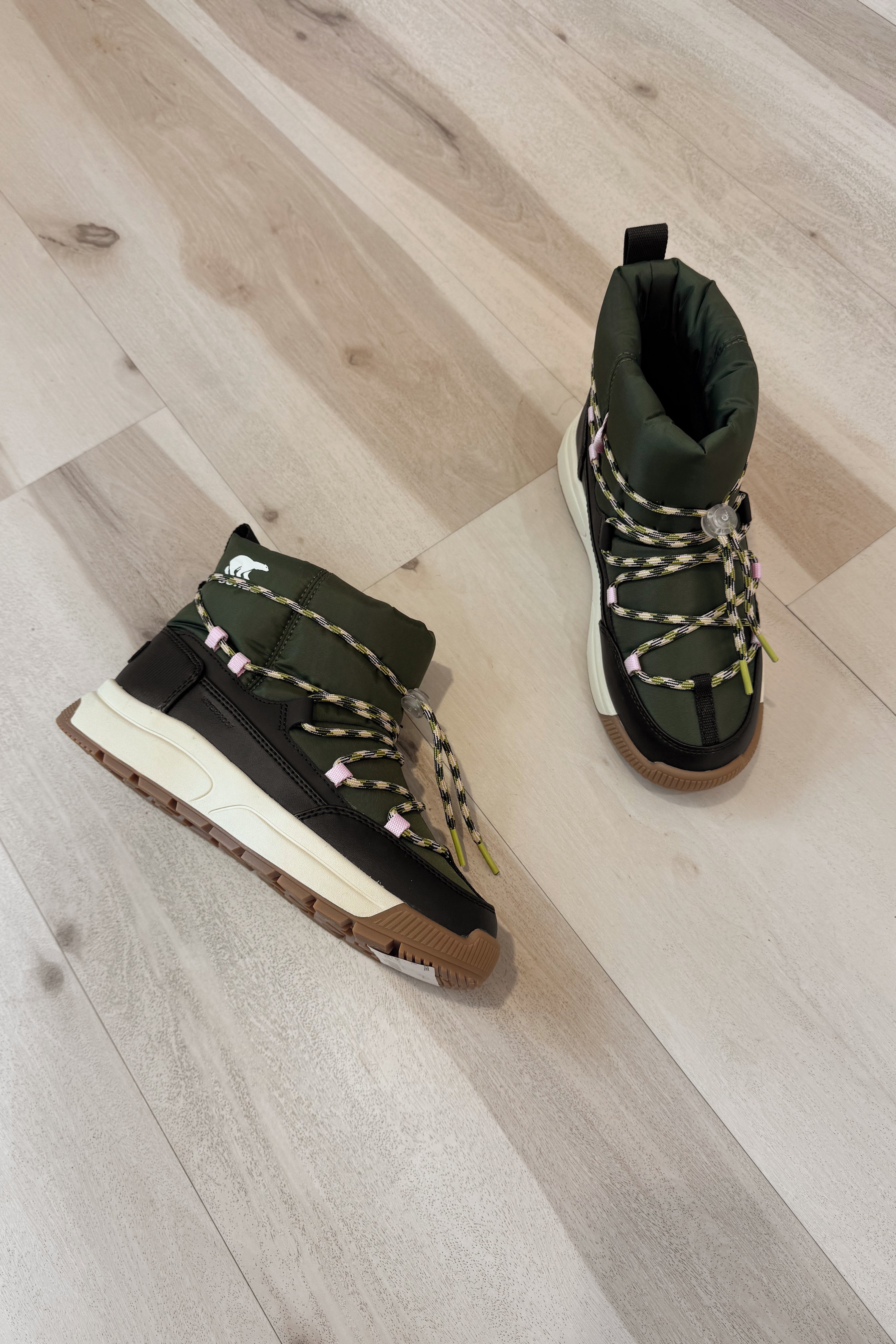 Sorel Whitney III Slip On WP Utility Green/Black Waterproof Boot- close up flat lay view
