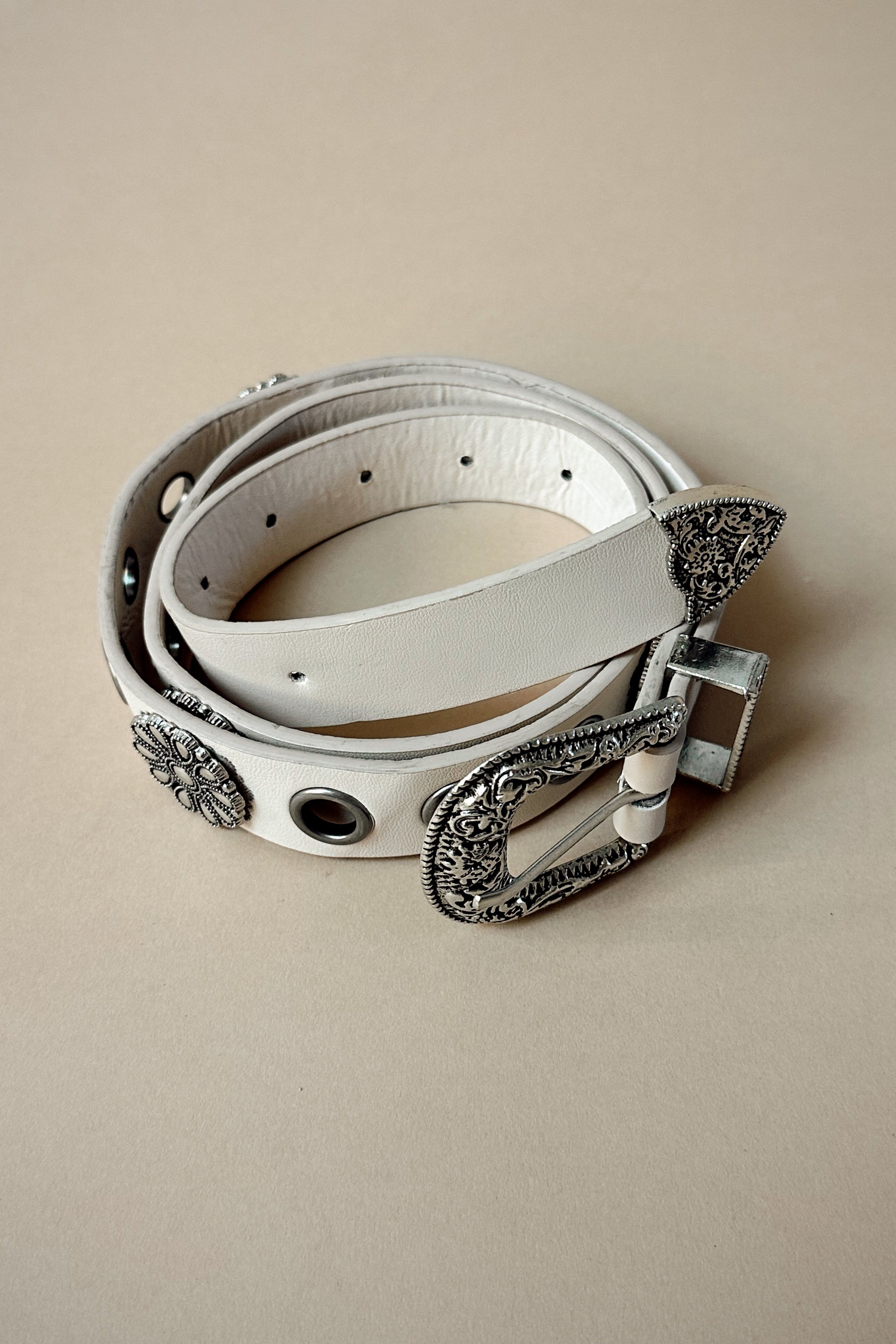 Alaina Ivory & Silver Floral Western Belt- close up flat lay view