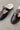 Harlah Chocolate Leather Plush Flats- close up top view