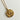 Close-up of the Aries Zodiac Gold Coin Necklace that has a ram on the coin. Shown against white background.