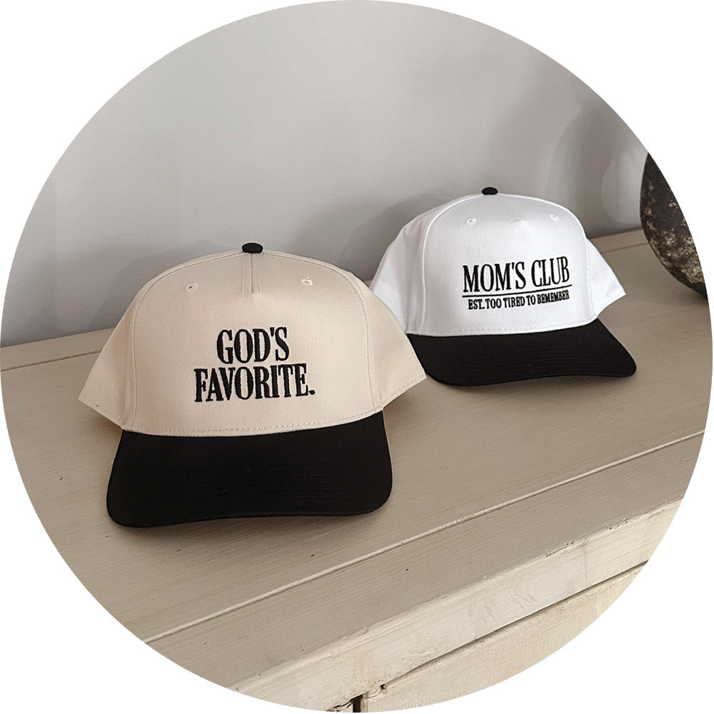 image of 2 embroidered hats that say god's favorite & mom's club